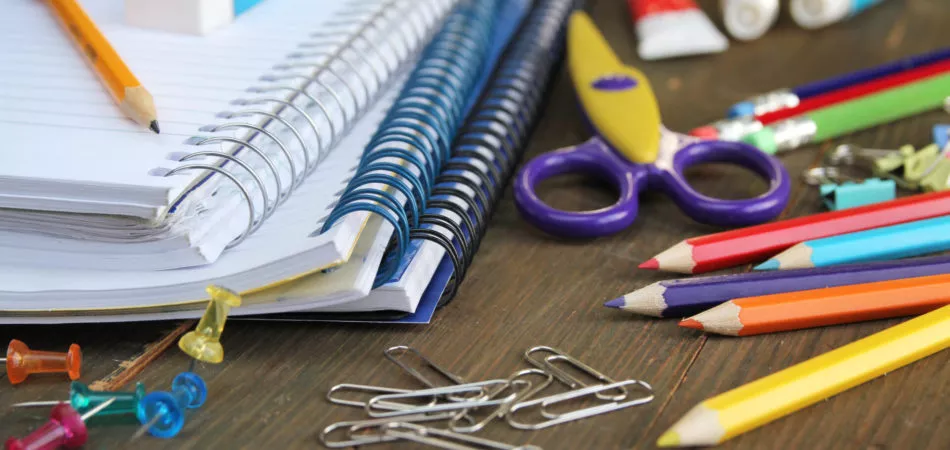 Material for school, paper clips, pencils, colors, cisor and notebook